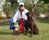 Bones with trainer Patti Kiernan after winning the Qualifying at the San Diego Retriever Club's field trial in February 2006 and placing 2nd in the Qualifying at the California South Coast Club's field trial in March 2006.