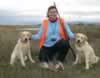 Amy Beck hunting with her six month old Hacker daughters, Foxy and Roxy, October 2006. (Merganser's Hacker MH, WC, CGC X Warden Abbigail)